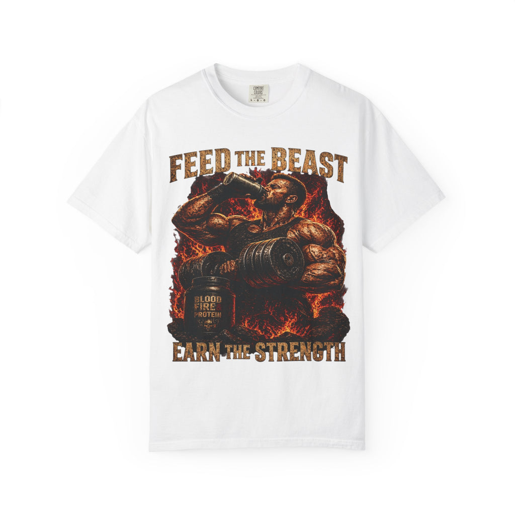 Feed the Beast garment-dyed tee, lifter mid-curl with protein shake framed in fire